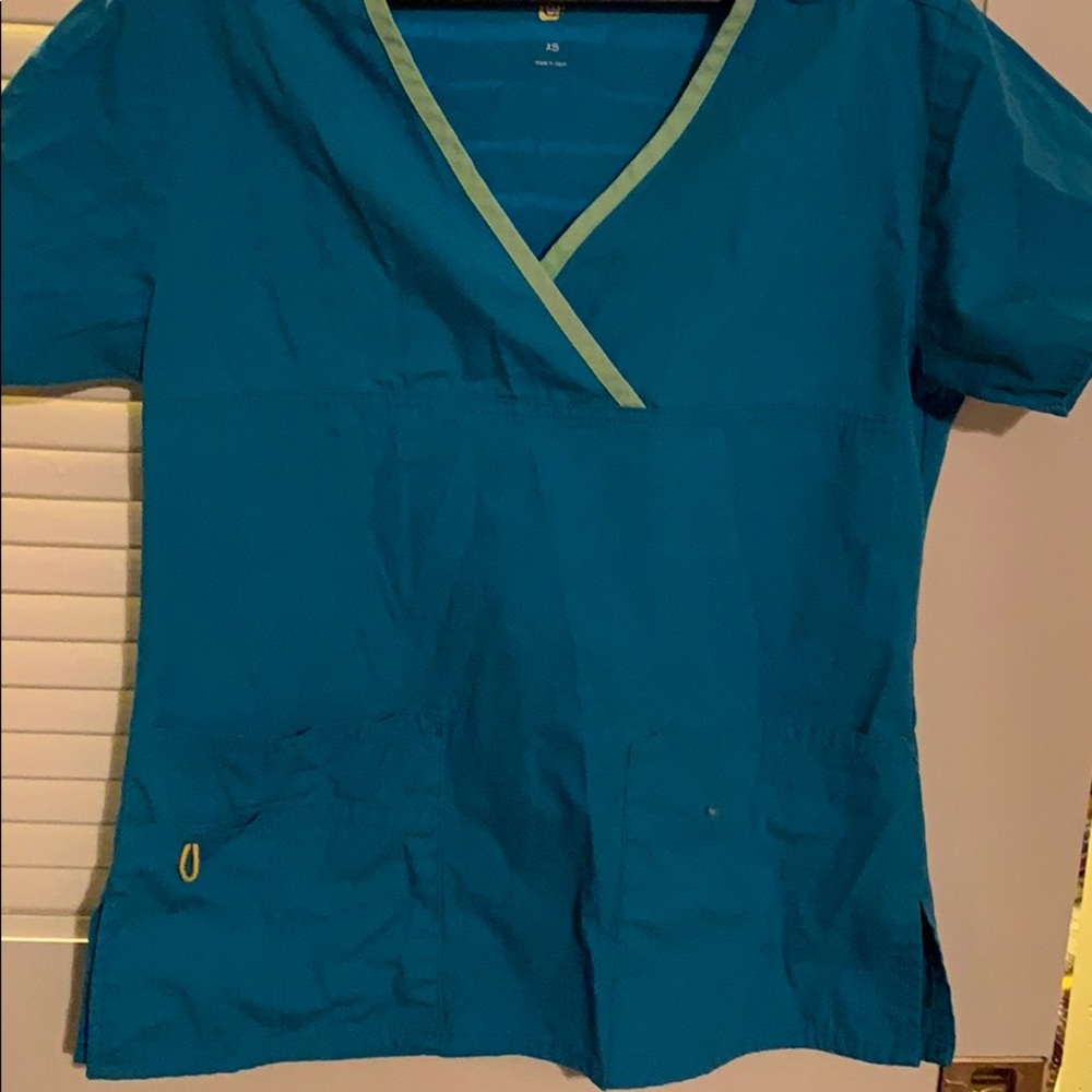 Blue and green scrub top